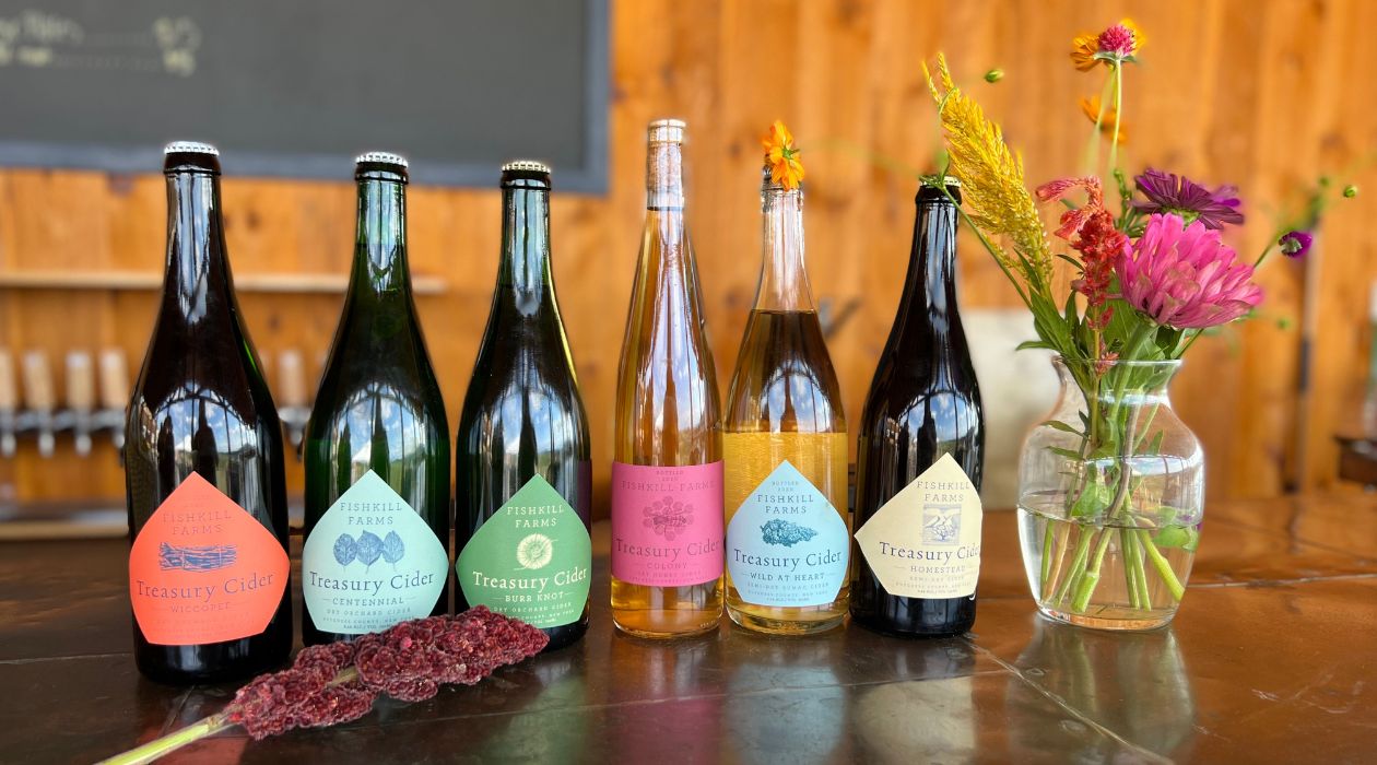 Lineup of bottles at Treasury Cider