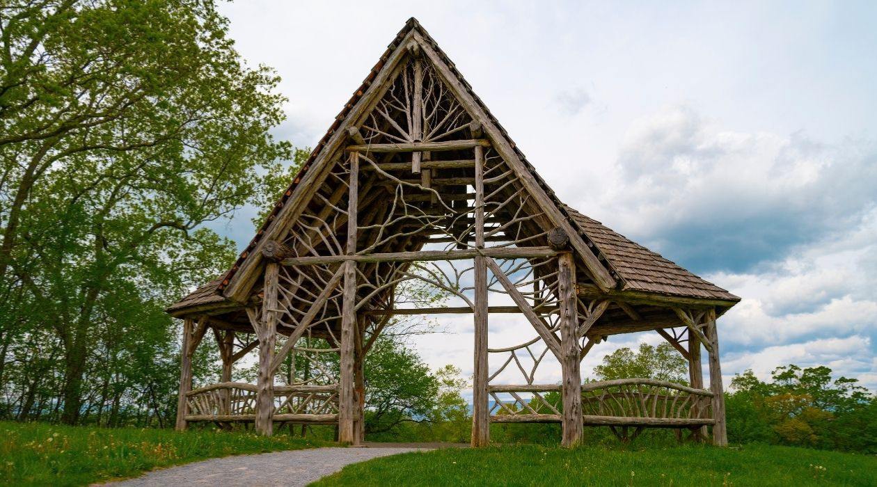 Gazebo like structure on a vast field at Poets Walk Park