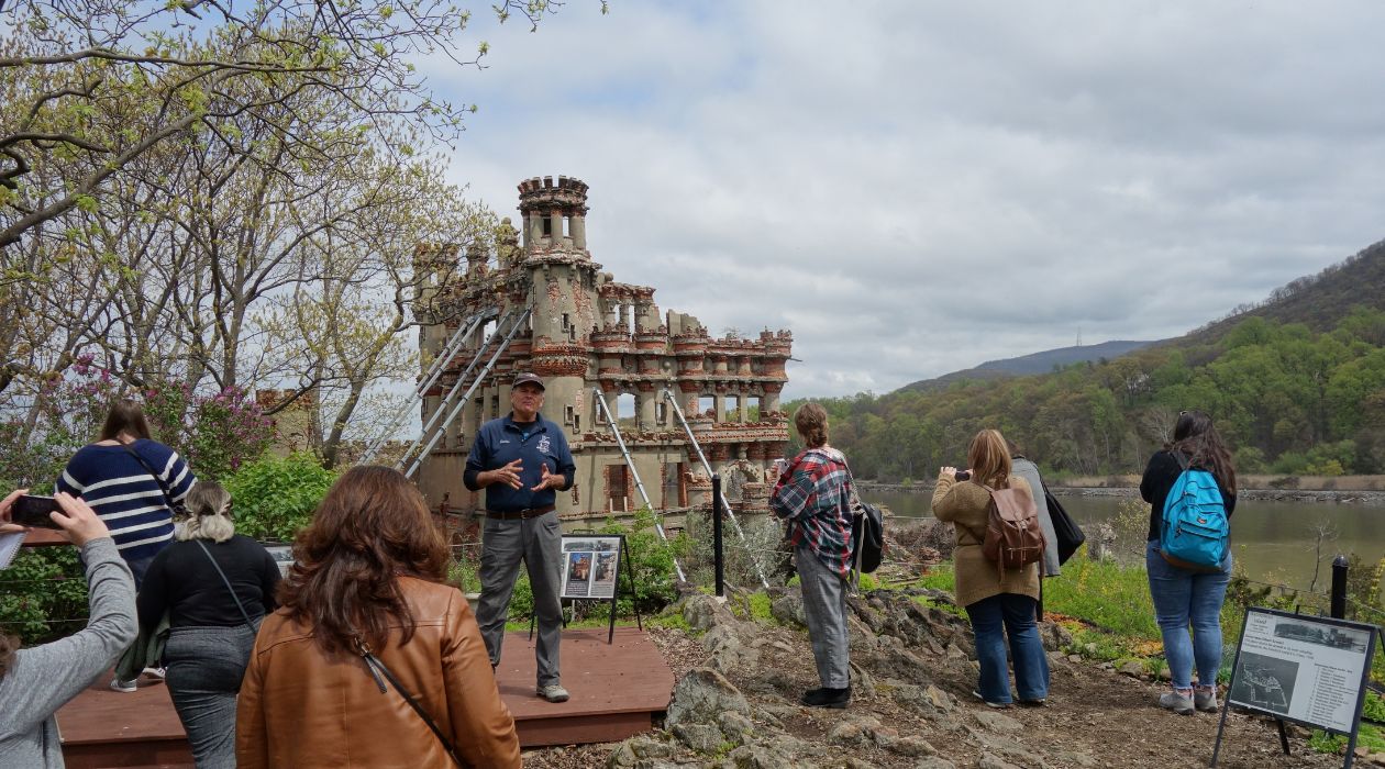 Group of people on a tour of Bannerman Castle on the Hudson River