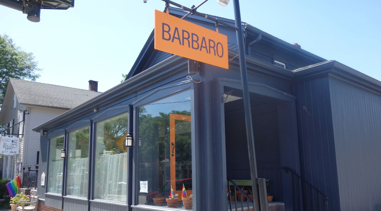 Barbaro exterior gray front with orange signage